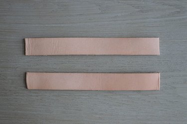 Two leather strips cut to 8 inches long