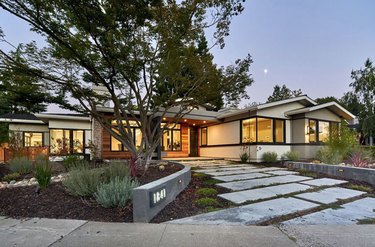 contemporary ranch home with layered materials