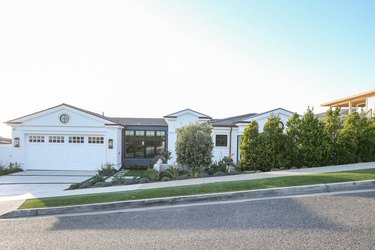 home with carriage style white garage door