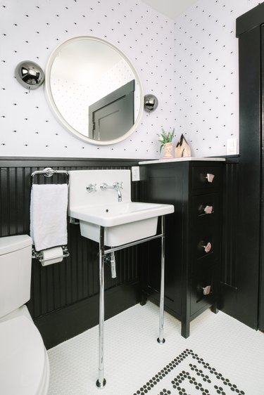 Bathroom designed by Black Lacquer Design with chrome faucet