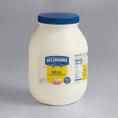Hellmann's 1 Gallon Real Mayonnaise over grey background