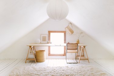 Sylvia Tribel  attic with paper pendant and plywood desk