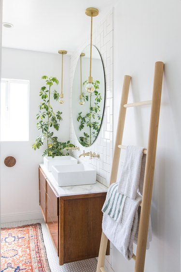 subway tile in small bathroom with midcentury style