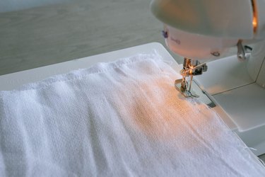 Sewing two fabric squares together with sewing machine
