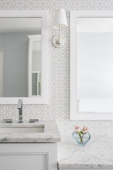 Bathroom designed by Karen B. Wolf Interiors with chrome faucet