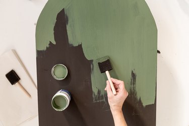 Painting green paint over magnetic board