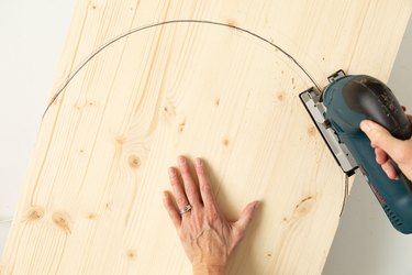 Cutting an arch into wood board