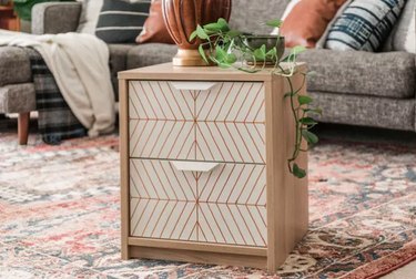 Painted side table with geometric design
