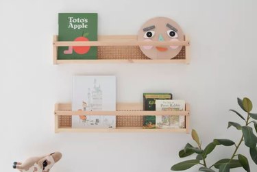 Cane and wood shelves in kid's room