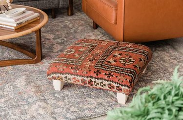 Ottoman with vintage rug fabric