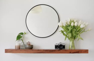 Floating wood shelf with mirror