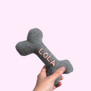 dog toy with lola text