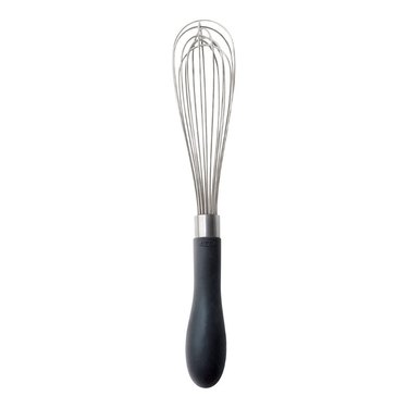 small whisk with black handle