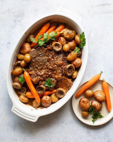 Grandbaby Cakes Pot Roast in white casserole dish