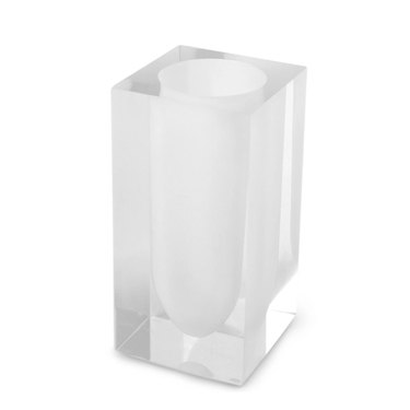 Clear acrylic toothbrush holder on white background