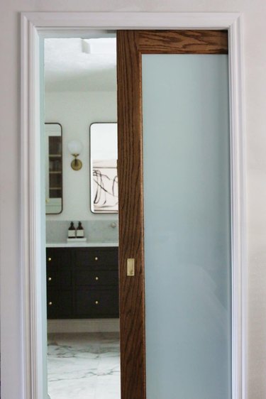 Small wood bathroom door with glass