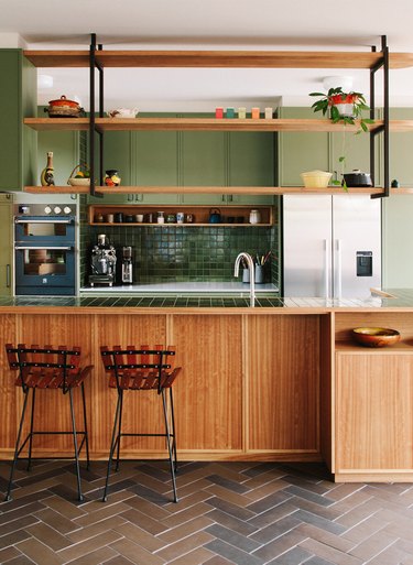 Should Wall Color Match Kitchen Cabinets midcentury kitchen with wooden and green cabinets