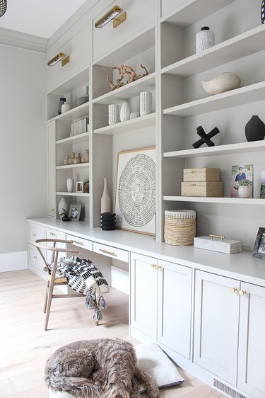 gray home office with built-ins and decorative objects