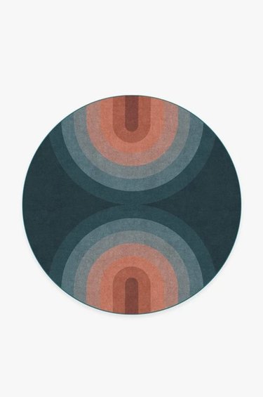 retro rainbow print in red and blue on round rug