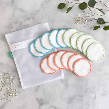 Sister Collective 16-Pack Reusable Cotton Rounds on marble surface