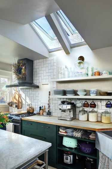 well-decorated kitchen with skylights