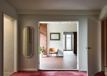 midcentury modern hallway with chair