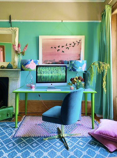 technicolor maximalist home office with turquoise walls, teal desk and blue office chair