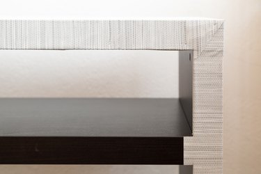 Covering an IKEA console table with peel-and-stick wallpaper