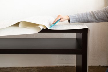 Covering an IKEA console table with peel-and-stick wallpaper