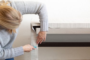 Covering an IKEA console table with peel-and-stick wallpaper