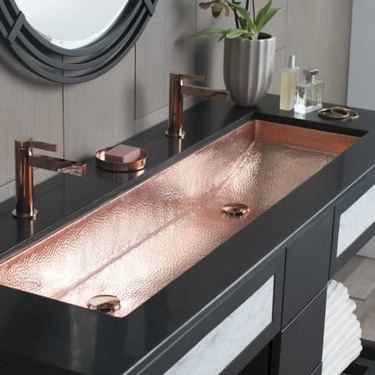 Double bathroom sink with copper bathroom faucets