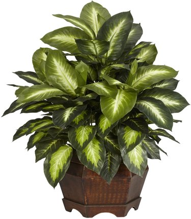 large faux plant in planter