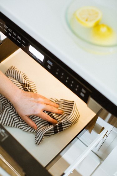 Wipe out microwave after cleaning with lemon