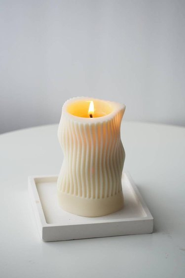 white wavy candle