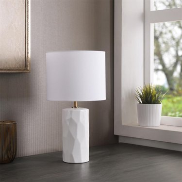 white ceramic table lamp