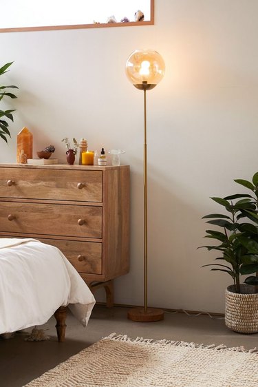 Bedroom Floor Lamps with luxurious single globe floor lamp in contemporary bedroom