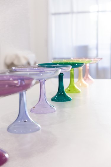 colorful cake stands on table by Estelle Colored Glass