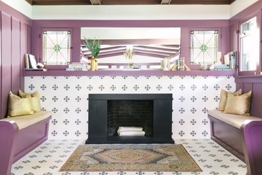 Wall-to-wall mauve contemporary fireplace mantel by Black Lacquer Design