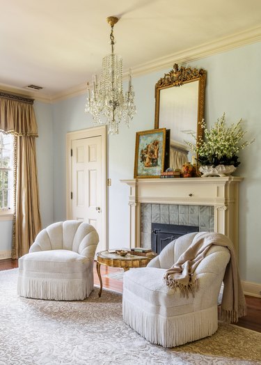 Traditional yet contemporary fireplace mantel by Thomas Guy Interiors