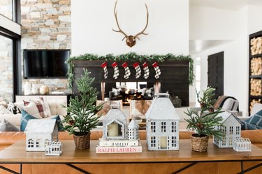 contemporary Christmas decor on sofa table in contemporary living room