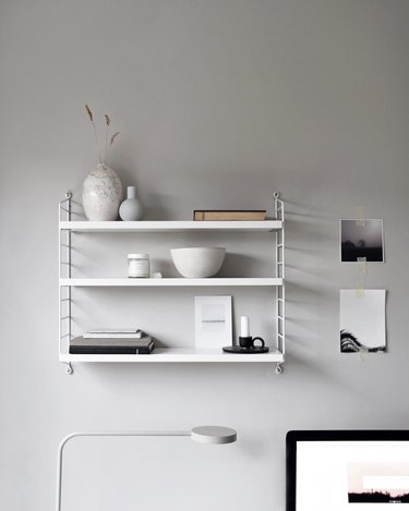 color meaning in gray office with open shelving