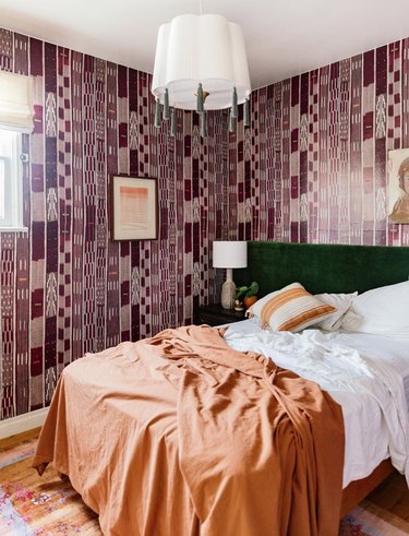 secondary colors in bedroom with purple, green and orange