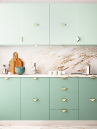 contemporary colors in mint green kitchen with marble backsplash