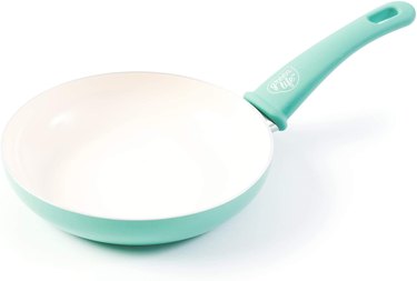 Mint green ceramic frying pan with white nonstick coating