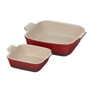 red and cream ceramic bakeware by Le Creuset