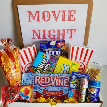 Box full of candy and treats for a movie night