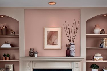 pink wall above fireplace