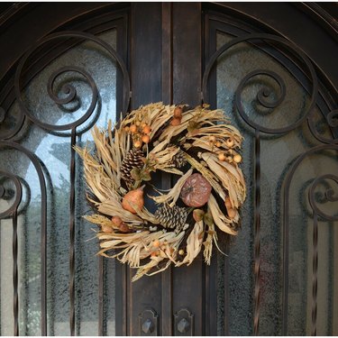Thanksgiving wreath with wheat berry and corn husk
