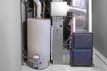 A home high-efficiency furnace with a gas water heater & humidifier.