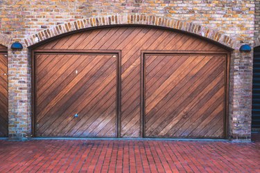 Wooden doors in a brick wall